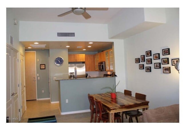 Kitchen & dining area (as furnished by resident #1) - 16 W Encanto Blvd Condo Unit 511