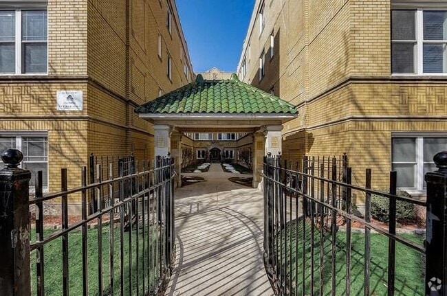 Building Photo - 4966 N Spaulding Ave Unit #G Rental