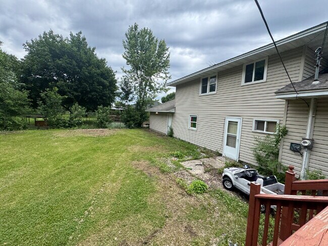 Photo - Spacious 4-Bed, 3-Bath Gem on Regent Ave - Your Dream Home Awaits in Brooklyn Park