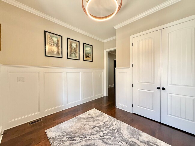 Photo - Luxurious 3BD, 4BA Raleigh Townhome with a First Floor Master Bedroom, Bonus Sunroom, and Large U...