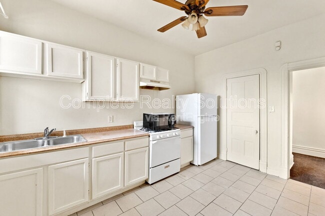 Building Photo - 5130 Kensington Ave Unit 2