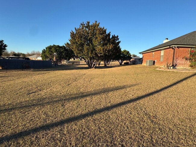 Photo - Charming 3-bedroom, 2-bath home offering peaceful country living on just under an acre.