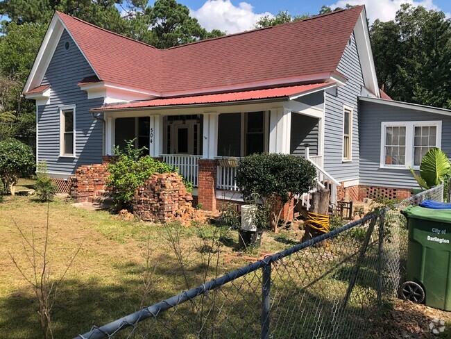 Building Photo - Four Bedroom  Two Bath Home