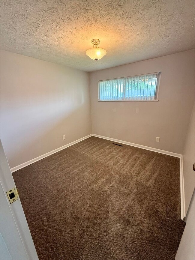 Photo - Updated 3BR Brick Ranch | Screened Porch | Attached Garage