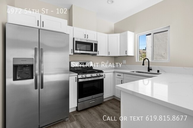 Building Photo - 4972 54th St Unit 102