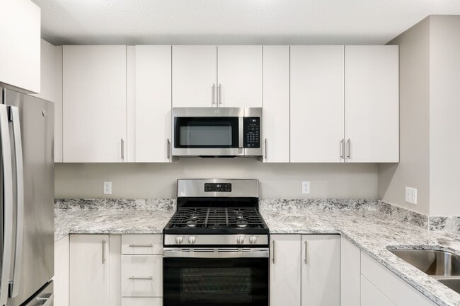 Photo - Enjoy where you rent! 3bd 3ba 2car garage townhome available now