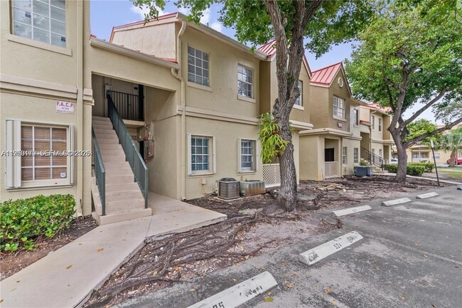 Building Photo - 18348 NW 68th Ave Unit D