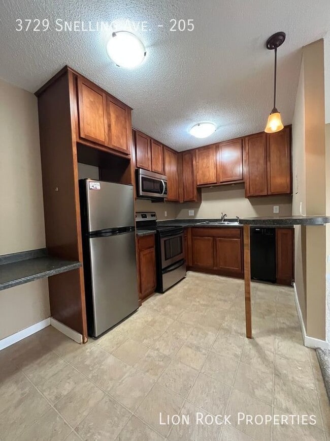 Building Photo - 3729 Snelling Ave Unit 205