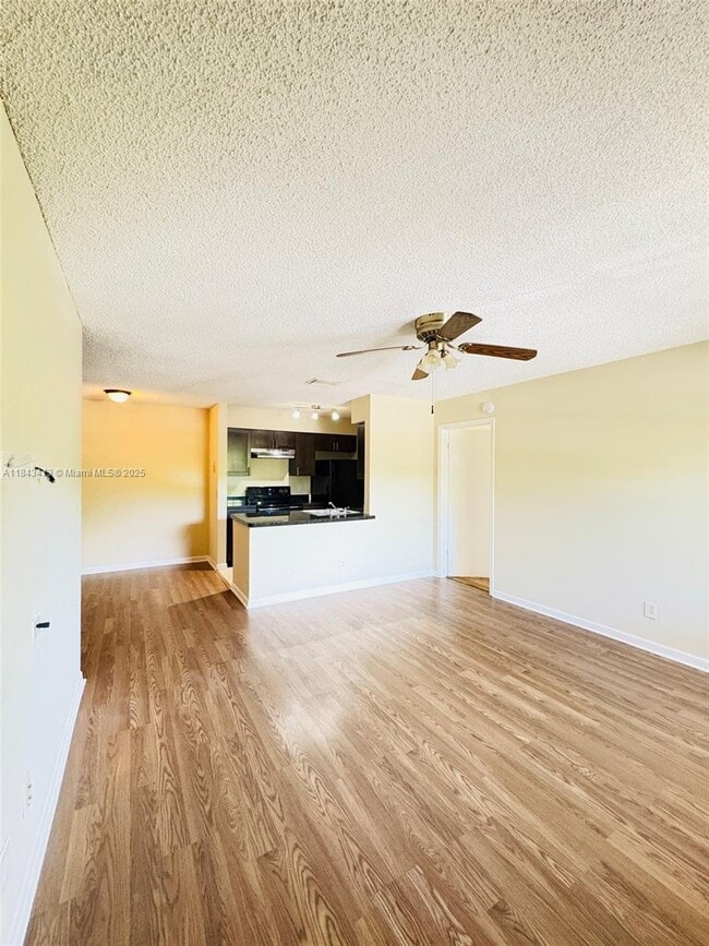 Building Photo - 790 NW 103rd Terrace Unit 203 Rental