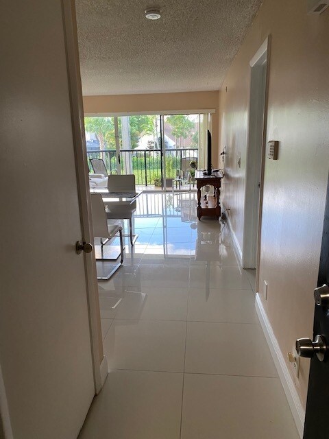 Photo - 8891 Wiles Rd Unit 203