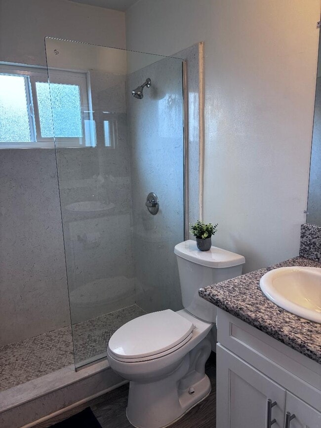 unit 38-bathroom with a tile shower