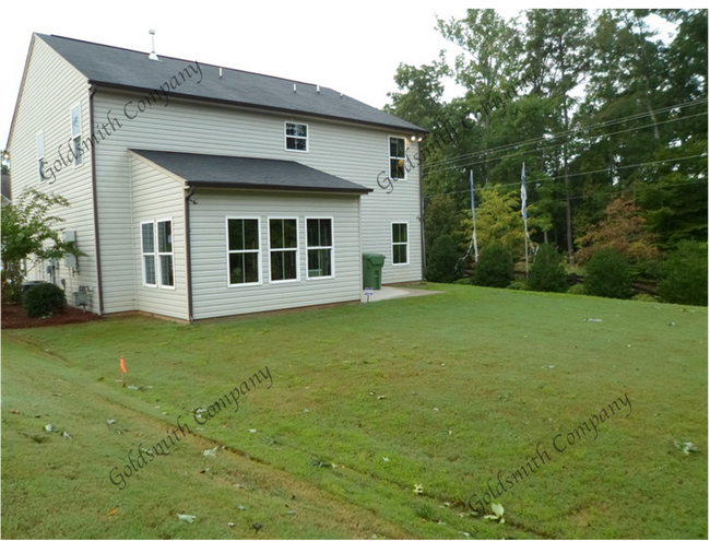 "4-Bed in Greenville - Spacious 2,389 Sq Ft with Fireplace & Hardwood Floors!"