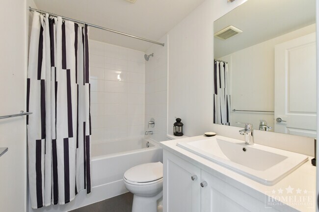 Photo - Spacious 4 Bedroom 4 Bathroom Townhome at King’s Landing with Double Garage Balcony and Yard Space Unit 52