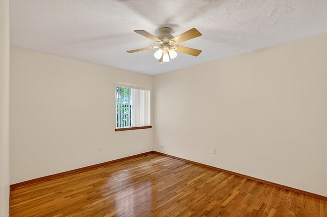 Photo - Charming Ranch Home with Hardwood Floors, Fireplace & Lush Curb Appeal