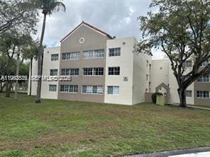 Building Photo - 6155 NW 186th St Unit 207