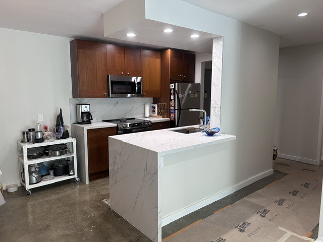 Newly remodeled kitchen with stainless steel appliances - 1745 Camino Palmero St Unit 330