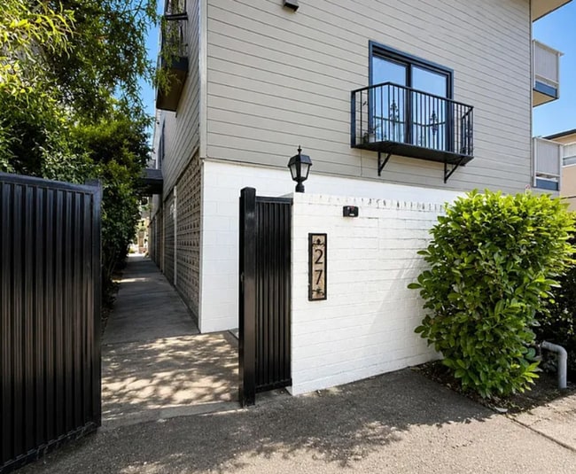 Photo - Spacious 2BR Condo with Central A/C, Bonus Room & Huge Storage – Walk to Burlingame Avenue