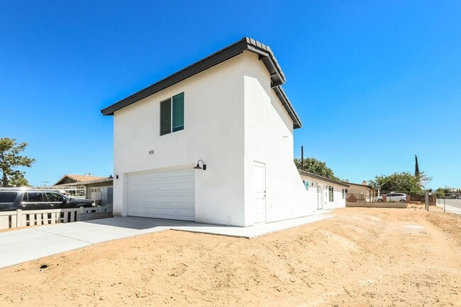 Photo - Spacious 3BR/2BA Home with Open Floor Plan, Garage & Washer/Dryer Unit Upstairs ADU