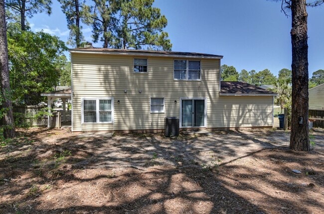 Photo - Spacious 3BR Home with Covered Front Porch & Expansive Backyard Near Dining & Shopping