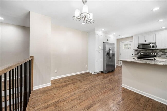 Photo - Move-In Ready 4BR Home | 3 Full Baths | Flex Space | Fenced Yard