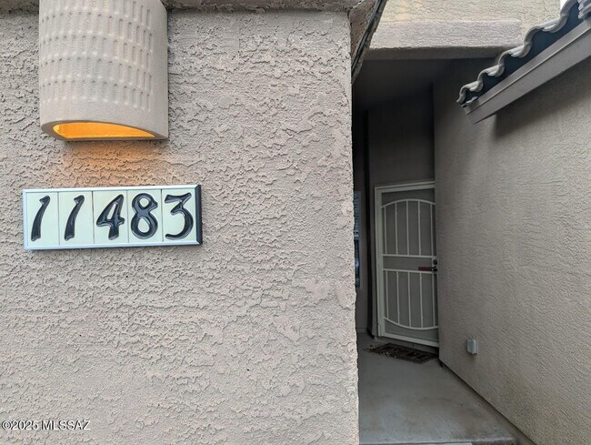 11483 W Magic Song St