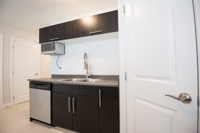 Photo - 110 Cumberland Ave N Unité 1