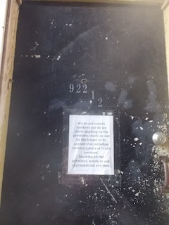 922 ½ doorway with sign banning smokers - 922 E Main St Unit 922 second floor