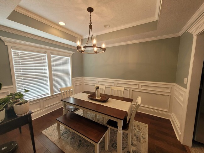 Photo - Exquisite Southern Living: 3BR/2BA Gem with Modern Touches, Fenced Yard, and Community Pool in Be...