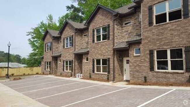 Building Photo - Heisman Villa Townhome