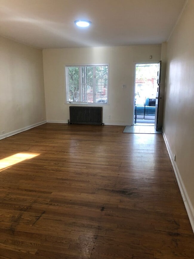 Photo - Great Home! 4 Bedroom House with Spacious Living Area! Full Basement for Storage! W/D Hook-ups! Y...