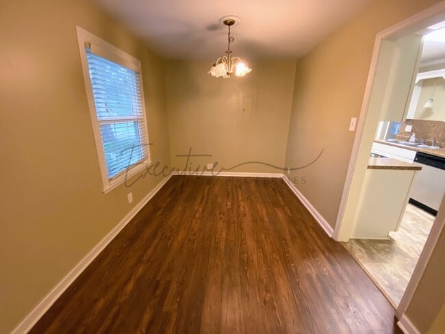 Photo - Well-Kept 3BR Home with Sunroom, Garage & Fenced Yard