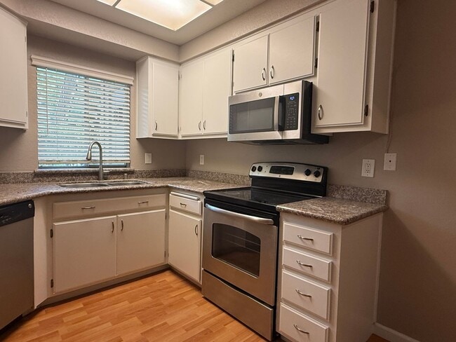 Photo - Remodeled 2 Bedroom 2 Bath Condo in Park-like Cedar Gables Community!