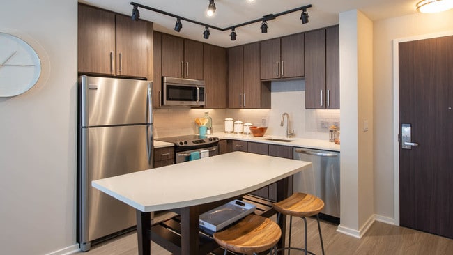 Kitchen with Quartz Countertops and Stainless Steel Appliances
