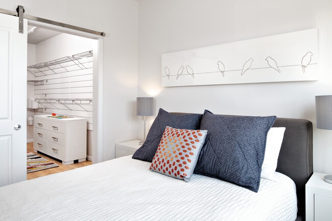 Bedroom with walk-in customizable closets