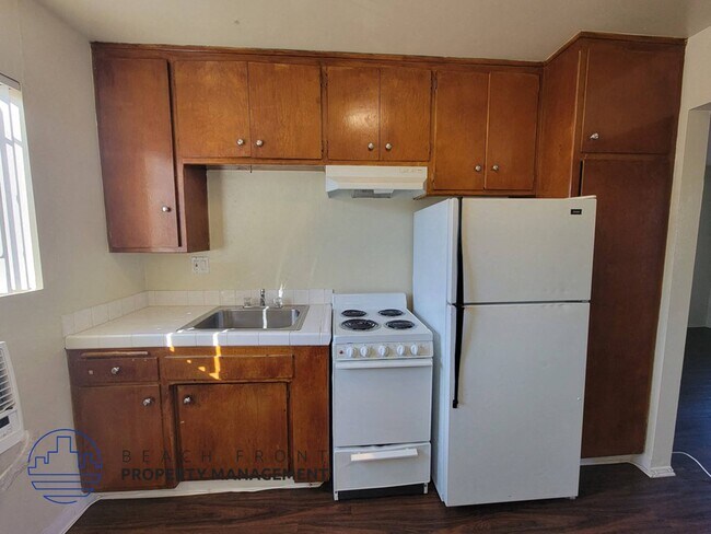 13921 Normandie Ave.