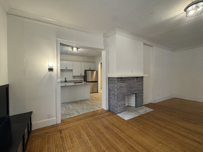 Photo - "Spacious 3-Bedroom Minneapolis Gem with Gleaming Hardwood Floors & 2 Full Baths!" Unit 1