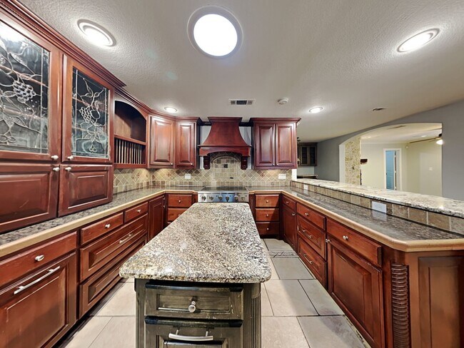 Photo - Spacious 4 Bed 2 Bath Home with Fireplace, Covered Patio & Fenced Yard in Denton, TX