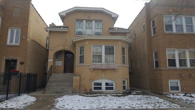 Building Photo - 5525 W Dakin St Unit 1