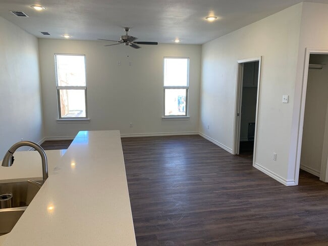 Photo - Brand new open concept quartz countertops Unit A