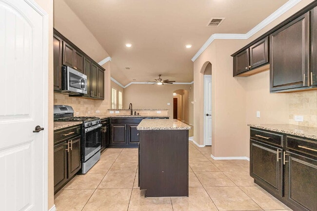 Photo - Golf Course Vibes at Home! Stylish 4BR Beauty with Private Putting Green in Fort Worth – Section ...