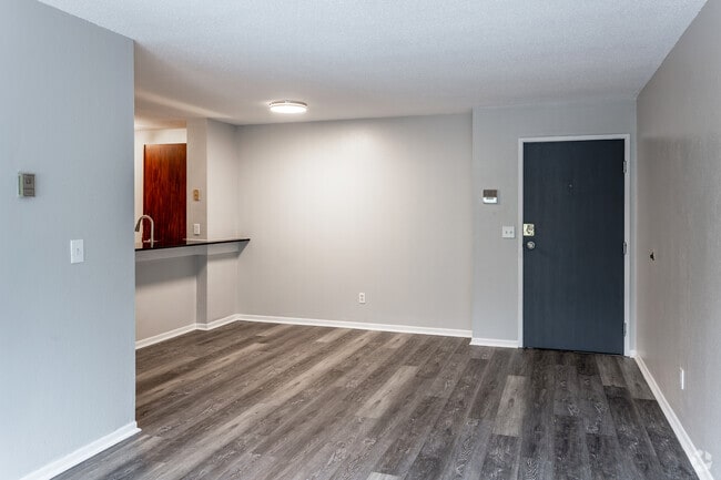 4BR, 1.5BA - 1,225SF - Living Room - The Commons