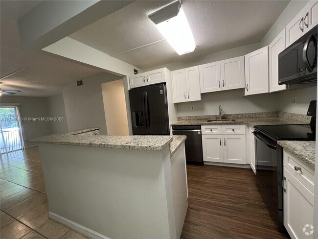 Building Photo - 4354 NW 9th Ave Unit 13-1C Rental