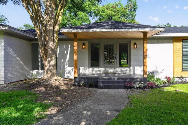 Photo - "Fully Remodeled 4-Bedroom Luxury Home Backing to a Greenbelt with Two Primary Suites!"