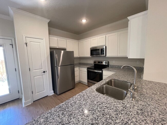 Photo - MOVE FAST—GATED TOWNHOME NEAR LACKLAND AFB WITH A PRIVATE YARD!