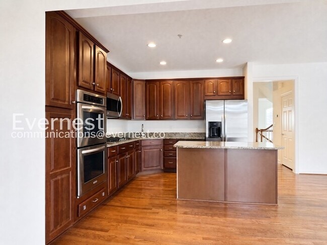 Photo - Spacious Living with Fireplace, Deck & Garage / 3 Bed & 4 Bath / Available Now!