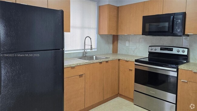 Building Photo - 6175 NW 186th St Unit 312 Rental