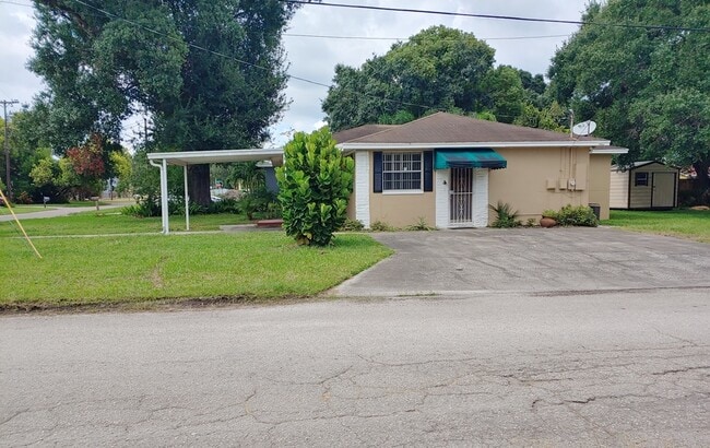 South side of home - 803 N Gomez Ave