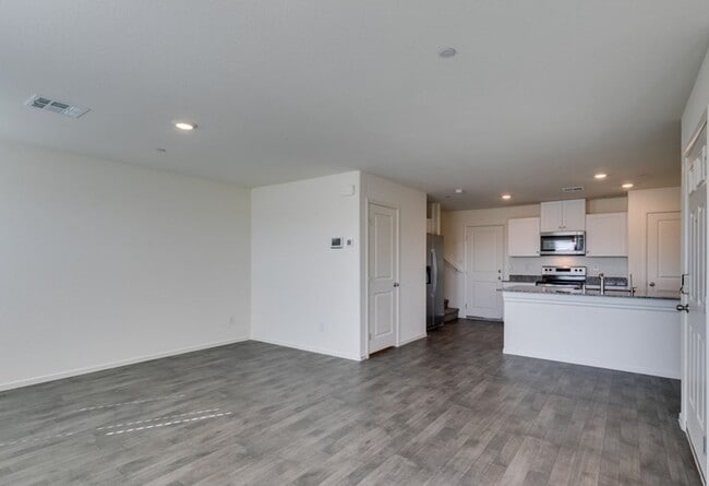 Photo - New townhome with attached 2 car garage.