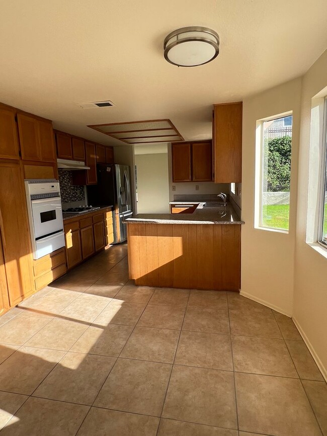 Building Photo - Large House with 3 Car Garage and Large Front and Back Yards!