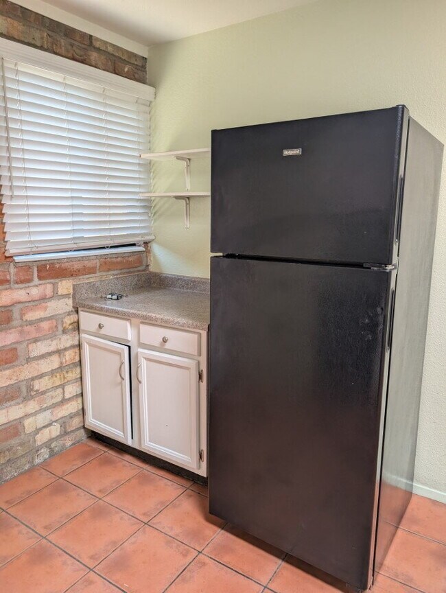 Photo - 2 Bedroom 1 bath with exposed brick Available August 1st 2026